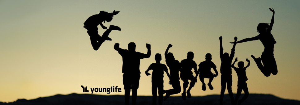 Image of celebration kids jumping in sunset